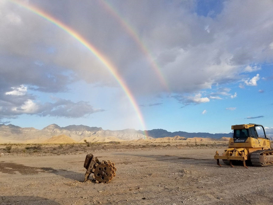 heavy equipment in Nevada with rainbow
