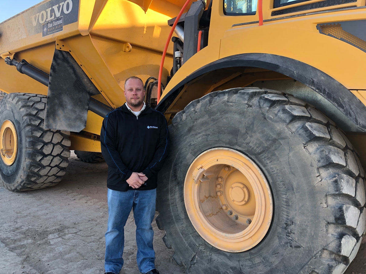 Jim Cameron and rock truck at Blue Diamond Machinery