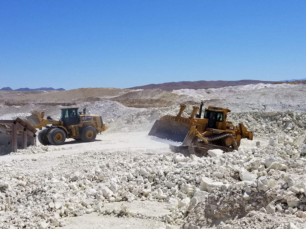 One of our CAT 972M Wheel Loaders and CAT D10R Dozers hard at work out in Amargosa Valley.