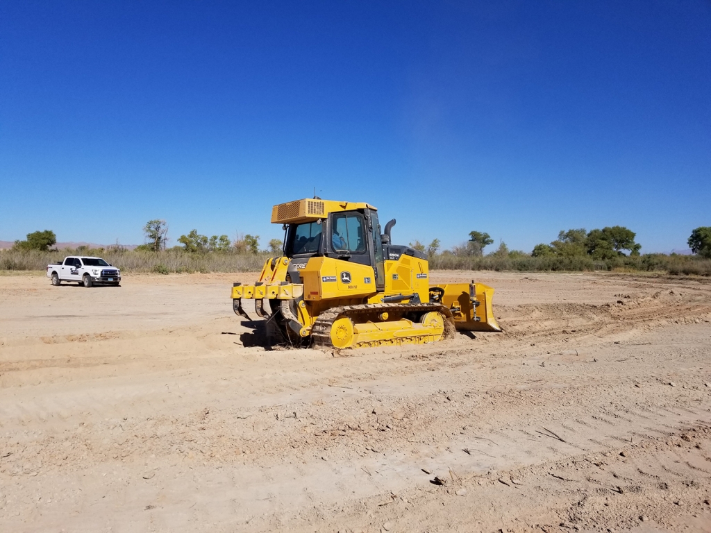 One of our John Deere 650K Dozers out in Moapa Valley.